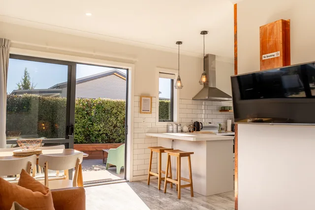Open-plan living and kitchen area in Front Cottage