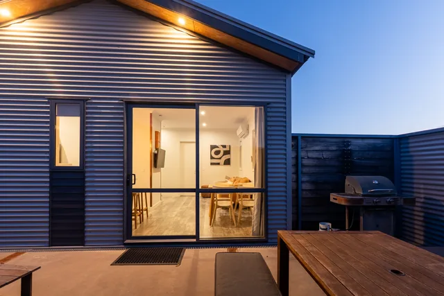 Front Cottage and private courtyard at dusk