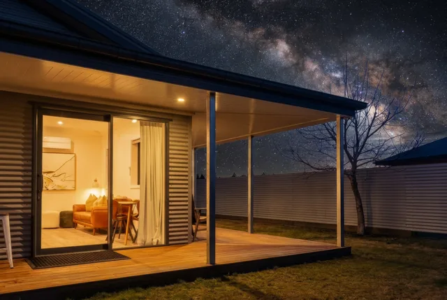 Rear King Studio verandah illuminated at night