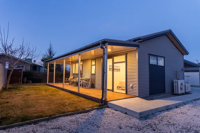 Rear King Studio exterior at twilight